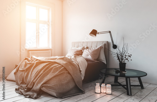 Single bed in room with radiators under windows photo