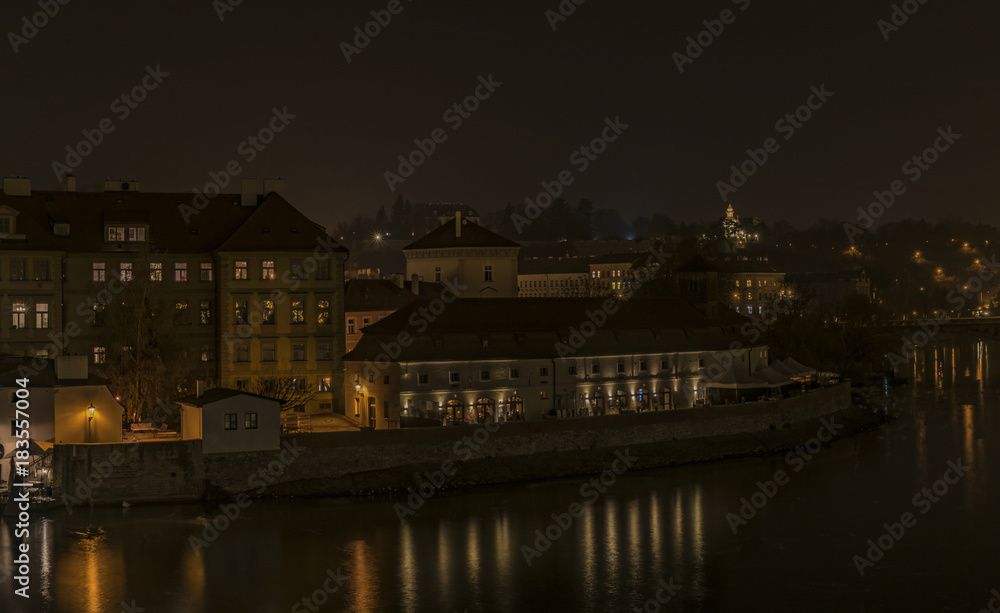 View in autumn night Prague near Vltava river