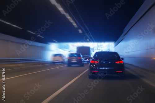 cars leaving tunnel in downtown