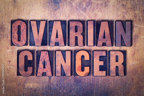 Ovarian Cancer Theme Letterpress Word on Wood Background
