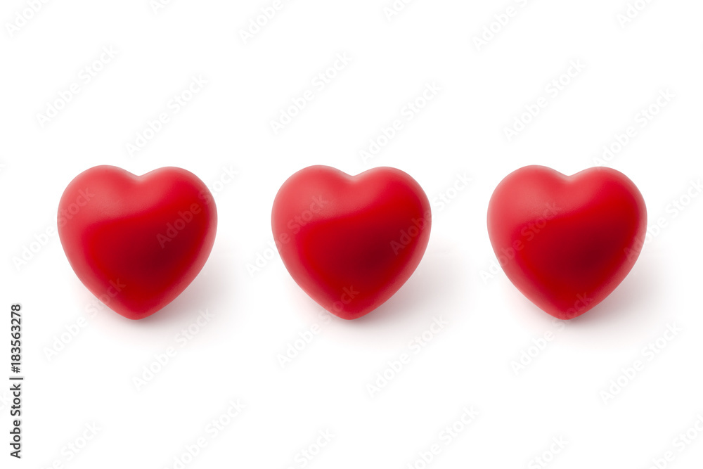 Three Red Hearts in a Row on White Background Three Red Hearts in a Row on White Background