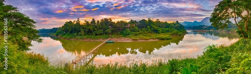 Beautiful view of a bamboo bridge. Laos landscape. Panorama photo