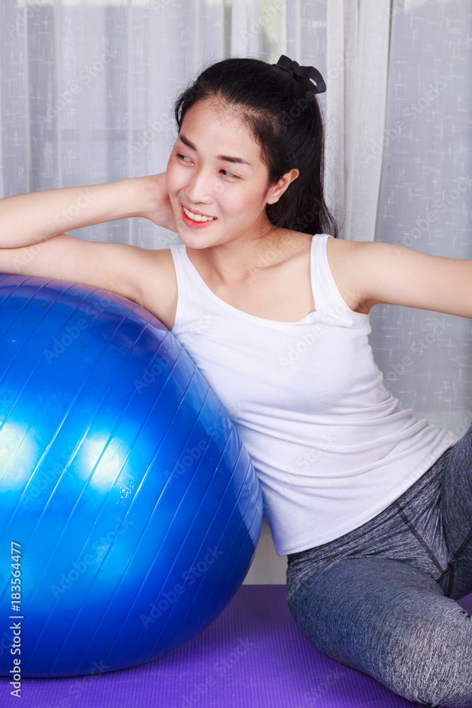 woman doing yoga exercise with fitness ball woman doing yoga exercise with fitness ball