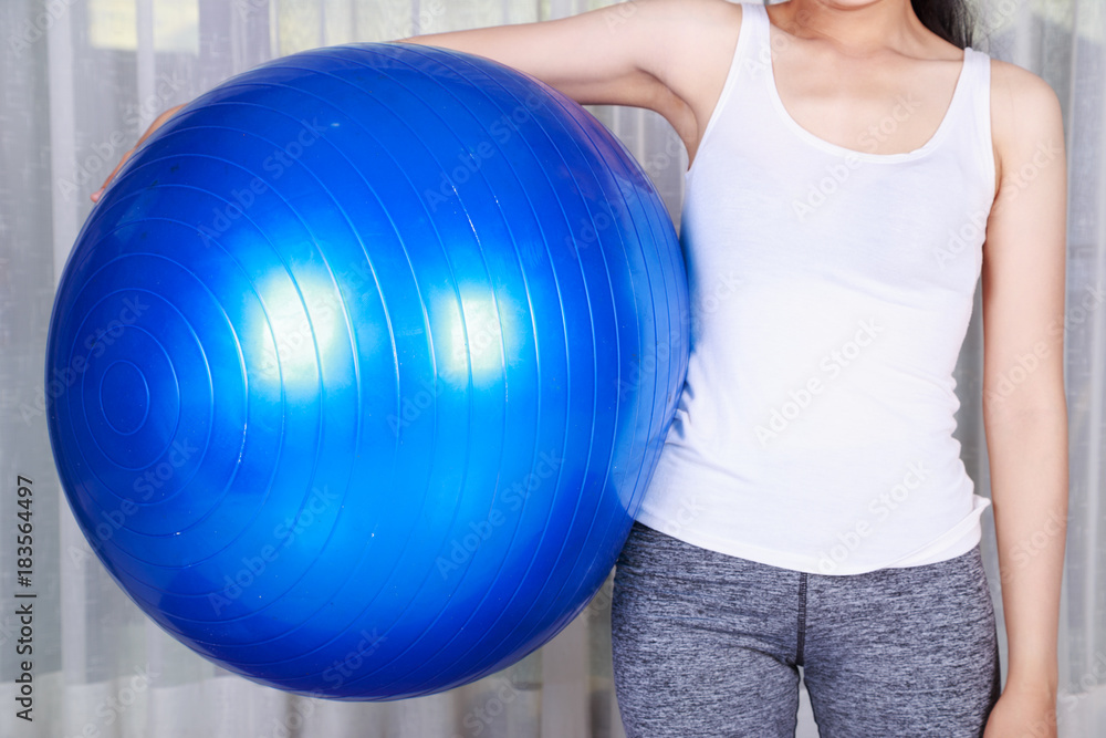 woman doing yoga exercise with fitness ball woman doing yoga exercise with fitness ball
