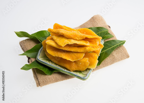 Dried Mango or Dried Mango slices on a background.