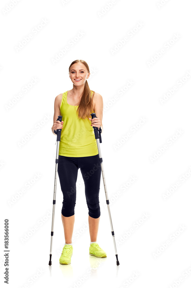 Woman nordic walking Woman nordic walking