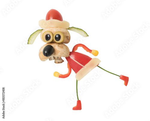 Running dog in Santa outfit made with vegetables