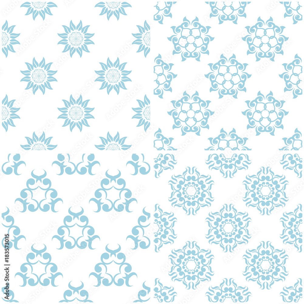 Floral patterns. Set of light blue elements on white. Seamless backgrounds Floral patterns. Set of light blue elements on white. Seamless backgrounds