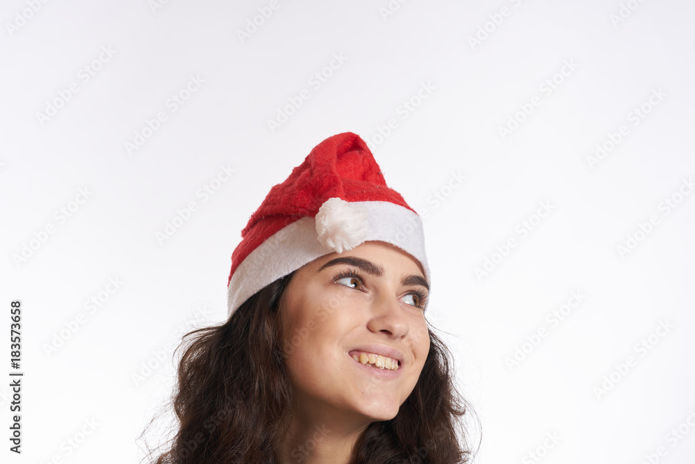 light background, free space for copy, woman in Christmas hat, holiday light background, free space for copy, woman in Christmas hat, holiday