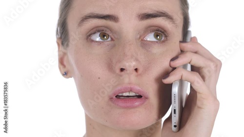 Close Up of Middle Aged WomanTalking on Smartphone with Customer photo