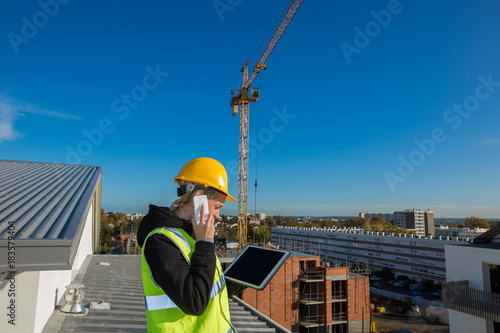 Femalen construction Site Inspector at the work site photo