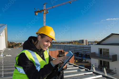 Close up of female worker on rooftop