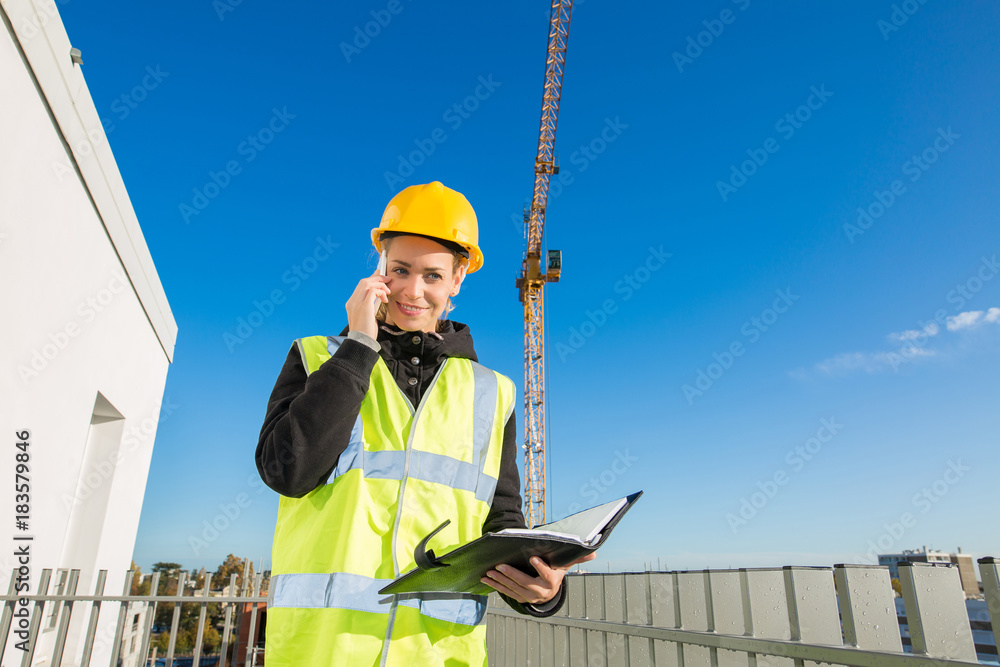 female engineer on the top of a construction site female engineer on the top of a construction site