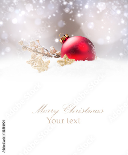 Christmas decoration in snow with free space. Celebration balls and other decoration. Christmas concept
