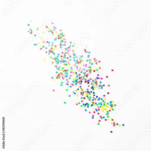Bright colorful confetti on white background. Party concept. Flat lay  top view