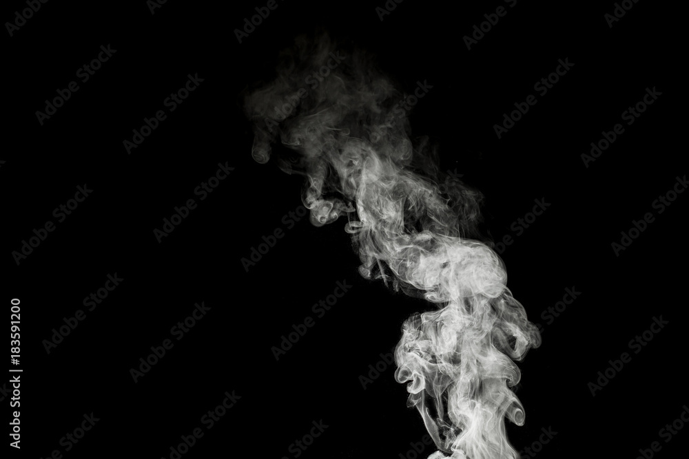 White smoke isolated on black background. With copy space. White smoke isolated on black background. With copy space.