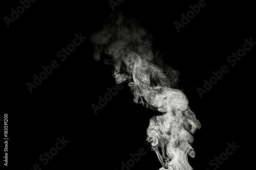 White smoke isolated on black background. With copy space.