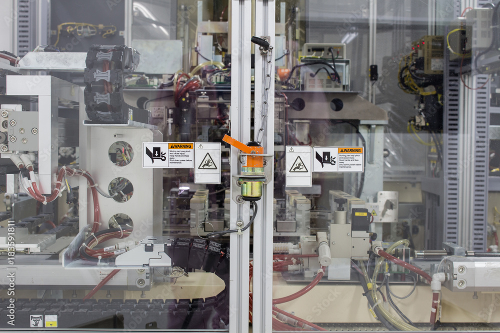 The safety plug on door of machine machinery used in work time. The safety plug on door of machine machinery used in work time.
