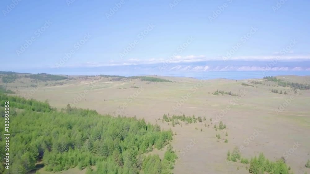 ProRes. Baikal lake shore and rocks from aerial view. Landscape. ProRes. Baikal lake shore and rocks from aerial view. Landscape.