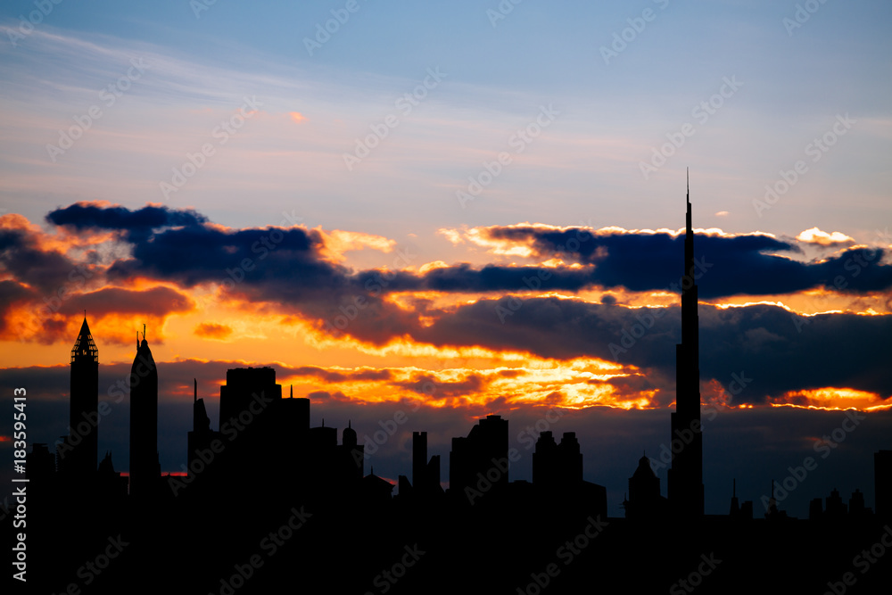 Dubai cityscape silhouette on sunset Dubai cityscape silhouette on sunset