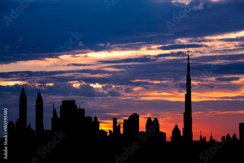 Dubai cityscape silhouette on sunset © silverkblack