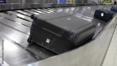 baggage claim area in the airport, abstract luggage line  with many suitcases