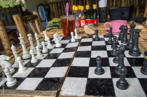 Playing chess in a restaurant in Indonesia.