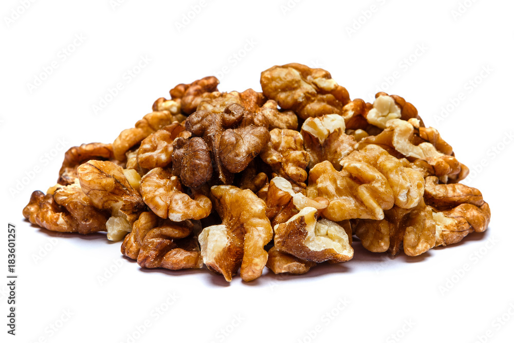 heap of shelled walnuts isolated on white background heap of shelled walnuts isolated on white background