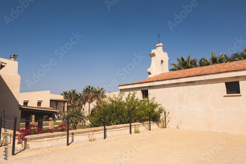view of square with buildings, church and trees, spain