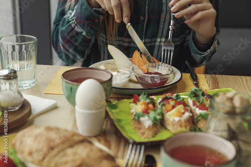 partial view of person eating healthy tasty breakfast
