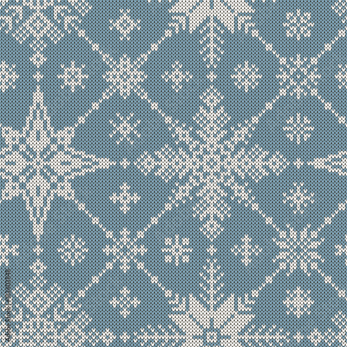 Seamless winter knitted pattern of snowflakes