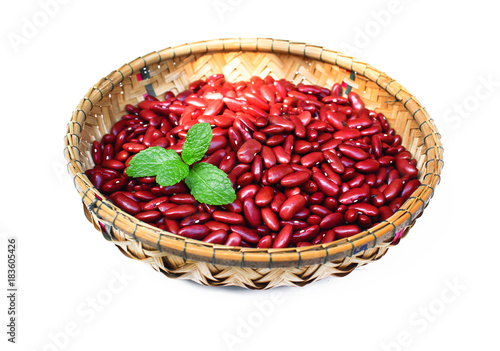 Red kidney bean on rattan cup on  white background