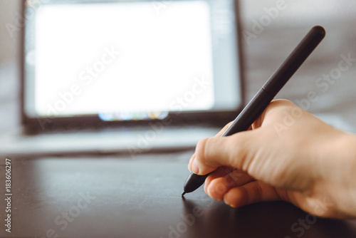 Graphic Tablet Being Used with a Pen by Female Hand