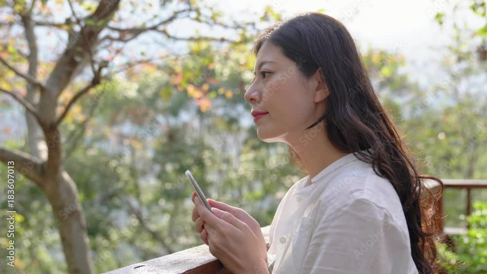 Asian girl using mobile phone work texting Asian girl using mobile phone work texting