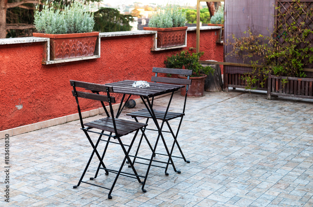 Elegant black metal table and chairs