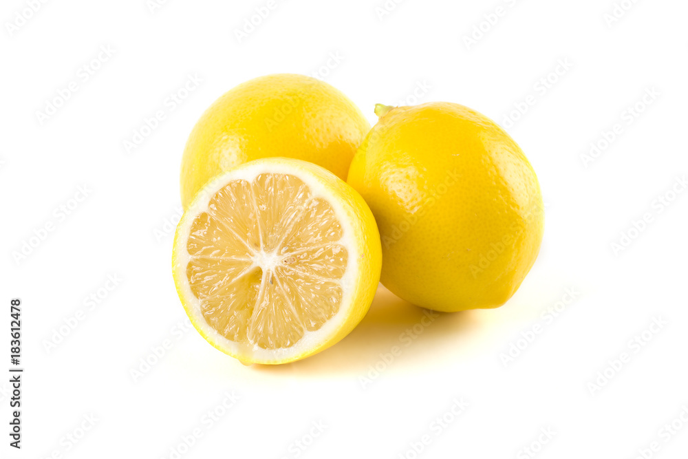 Lemons with leaves on a white background. Fresh lemons on a white background. Lemons with leaves on a white background. Fresh lemons on a white background.