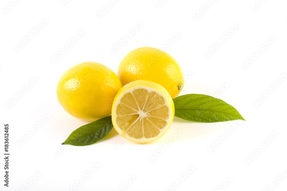 Lemons with leaves on a white background. Fresh lemons on a white background. Lemons with leaves on a white background. Fresh lemons on a white background.