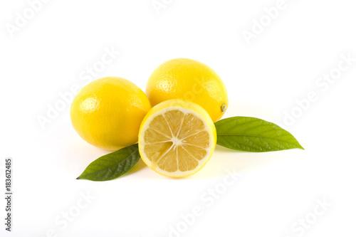 Lemons with leaves on a white background. Fresh lemons on a white background. © liubovi samoilova