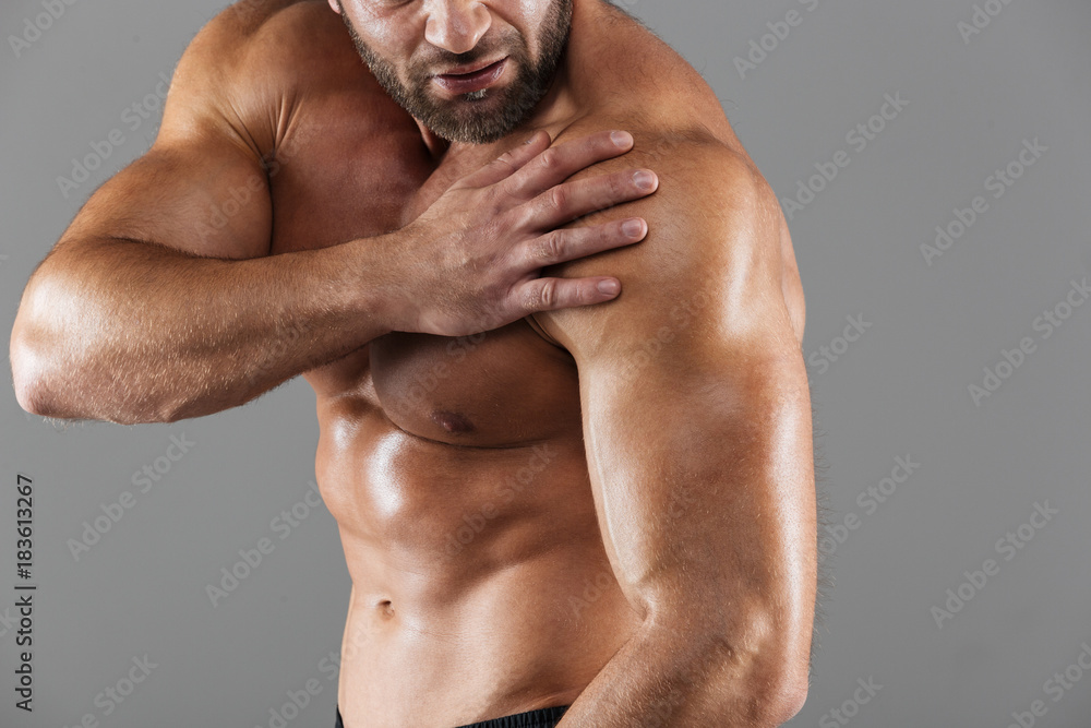 Fototapeta premium Close up portrait of a strong muscular male bodybuilder