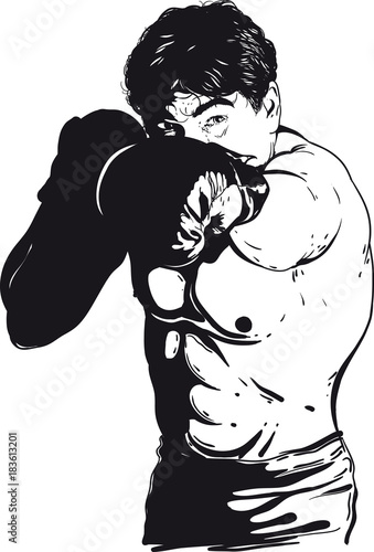 Strong muscular man boxing and striking with his left hand