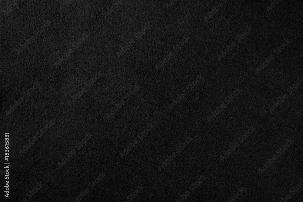 High resolution black texture felt texture fiber natural wool pattern background. Real black felt wool textile texture pattern background felted cloth texture pattern natural abstract background. Blac