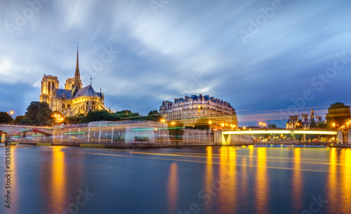 Long exposure river and cathedral of Saint Michel Notre Dame, Paris, France, Europe. Beautiful water and light color. best-known church buildings in the Catholic Church in the world. best for tourist. © Yahdi