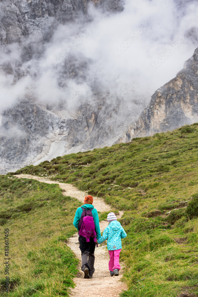 tourist girls at the Dolomites