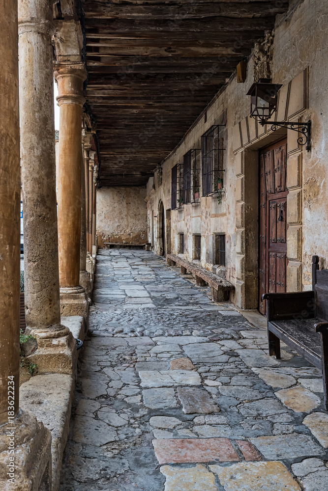 Typical Street with arcades in the historical town of Pedraza. Segovia. Spain.