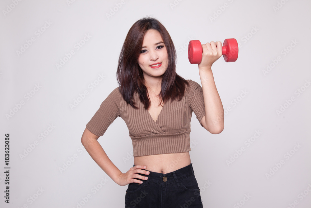 Healthy Asian woman with dumbbells. Healthy Asian woman with dumbbells.