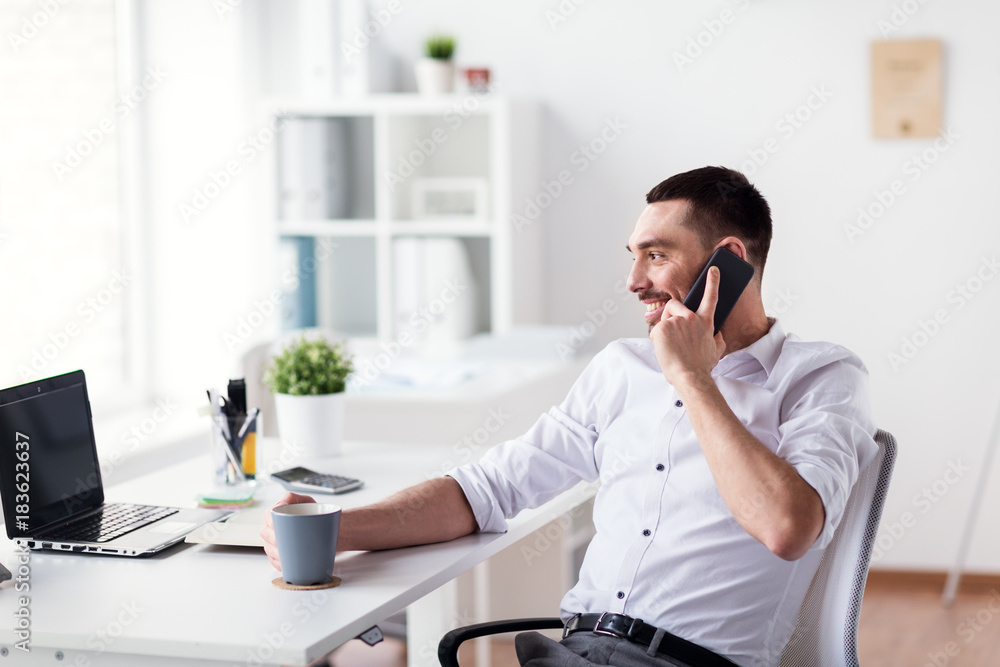 businessman calling on smartphone at office businessman calling on smartphone at office