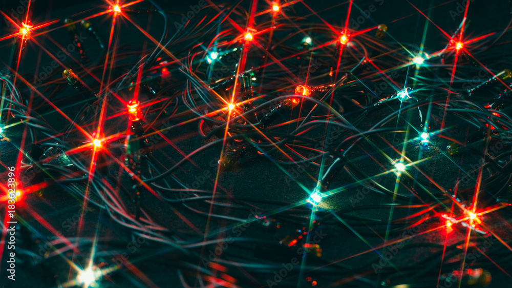 Colorful christmas lights on dark background Colorful christmas lights on dark background