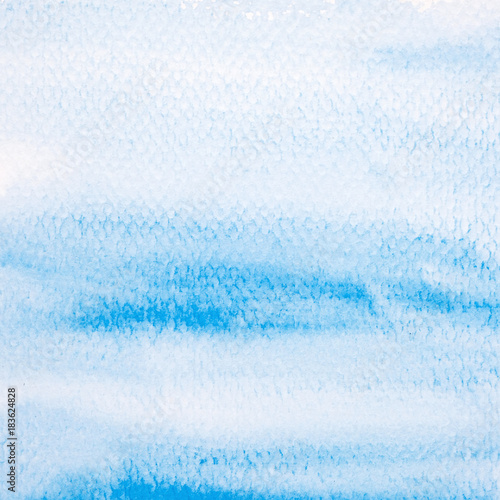Blue abstract watercolor painting textured on white paper background