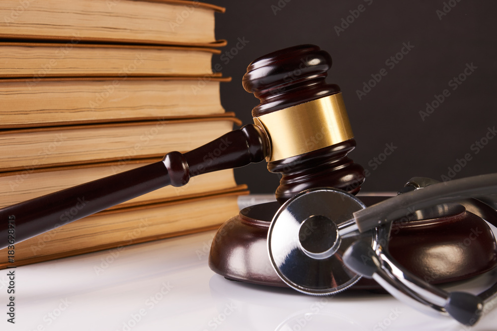 Judge's Gavel and medical stethoscope Judge's Gavel and medical stethoscope