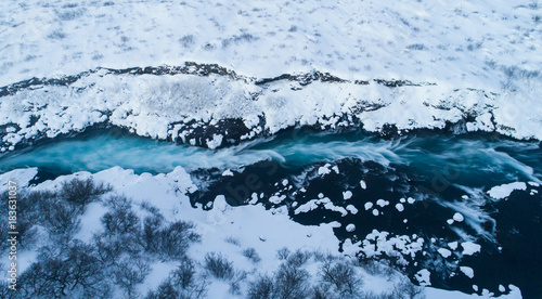 Aerial photo of waterfall in winter  Iceland